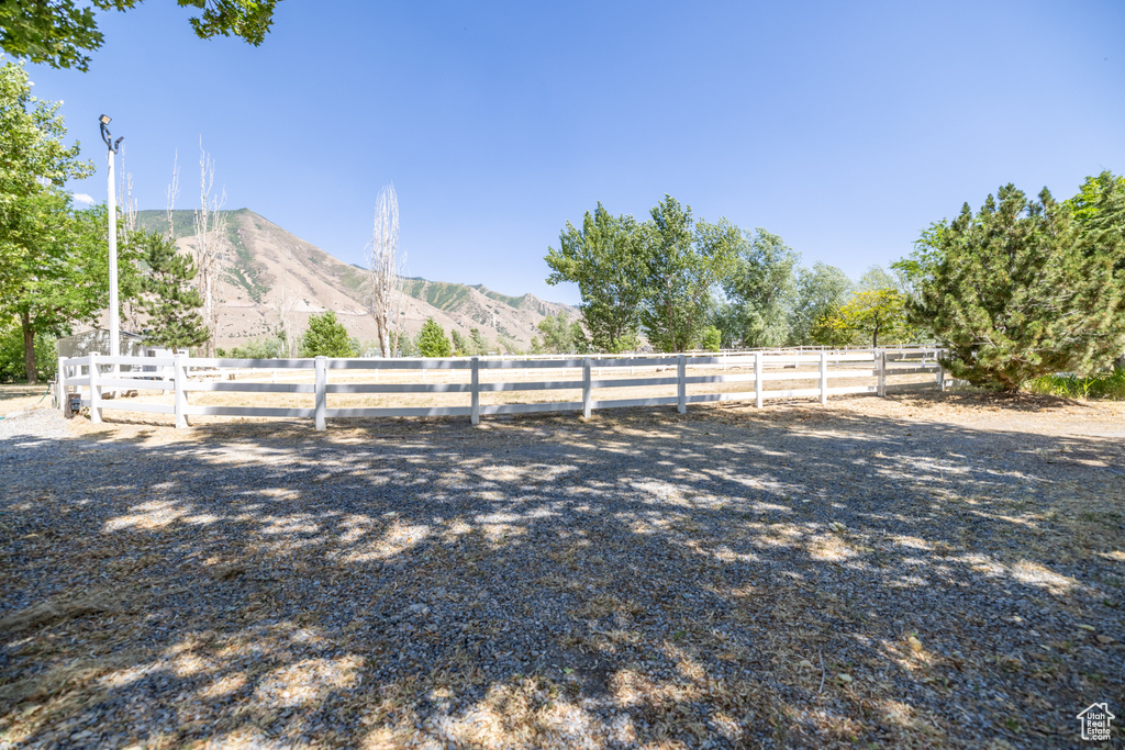 View of yard featuring a mountain view and a view of countryside