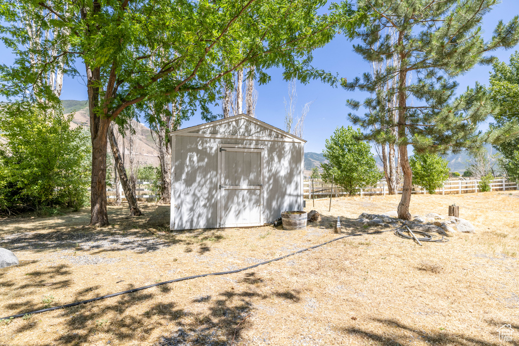 View of shed featuring a mountain view