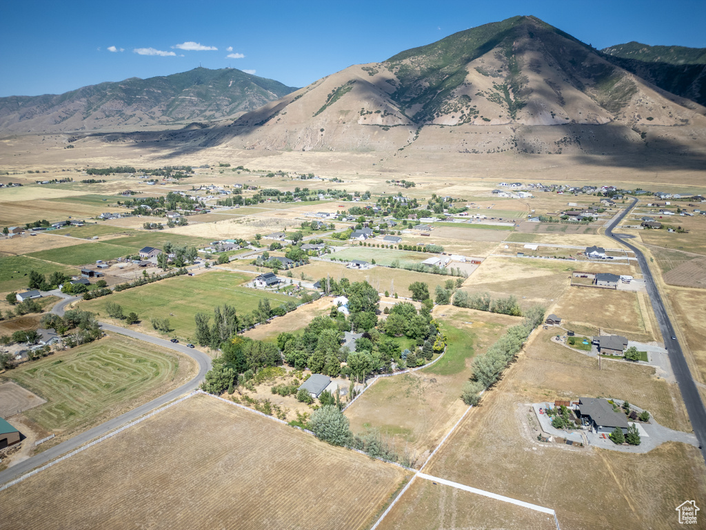 View of mountain background featuring rural landscape