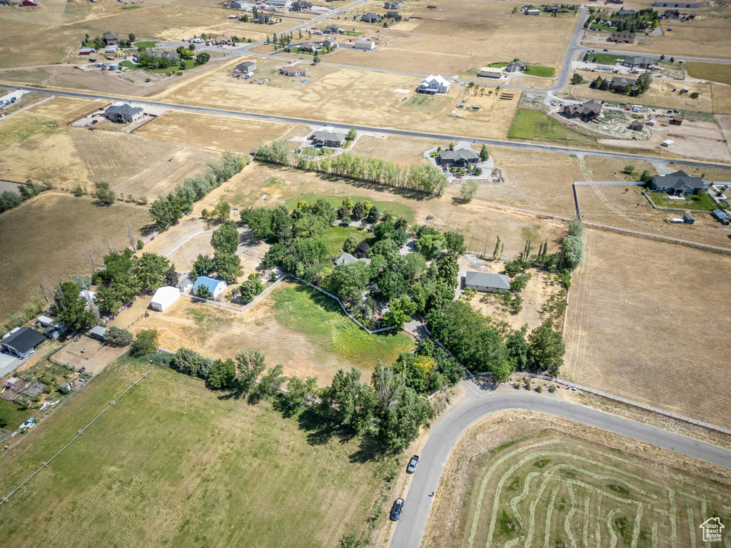 Aerial view of property and surrounding area with rural landscape