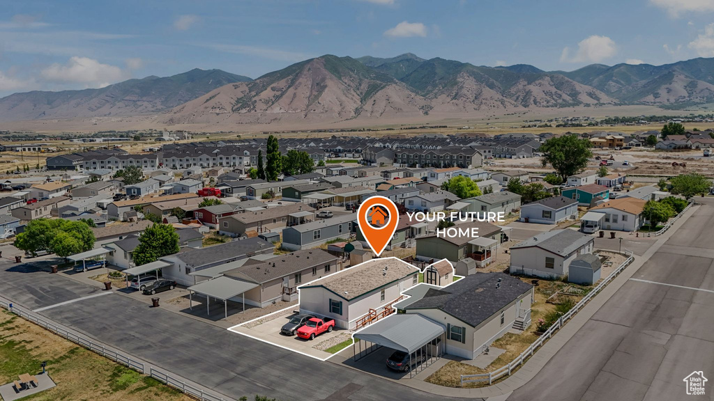 Aerial perspective of suburban area with mountains