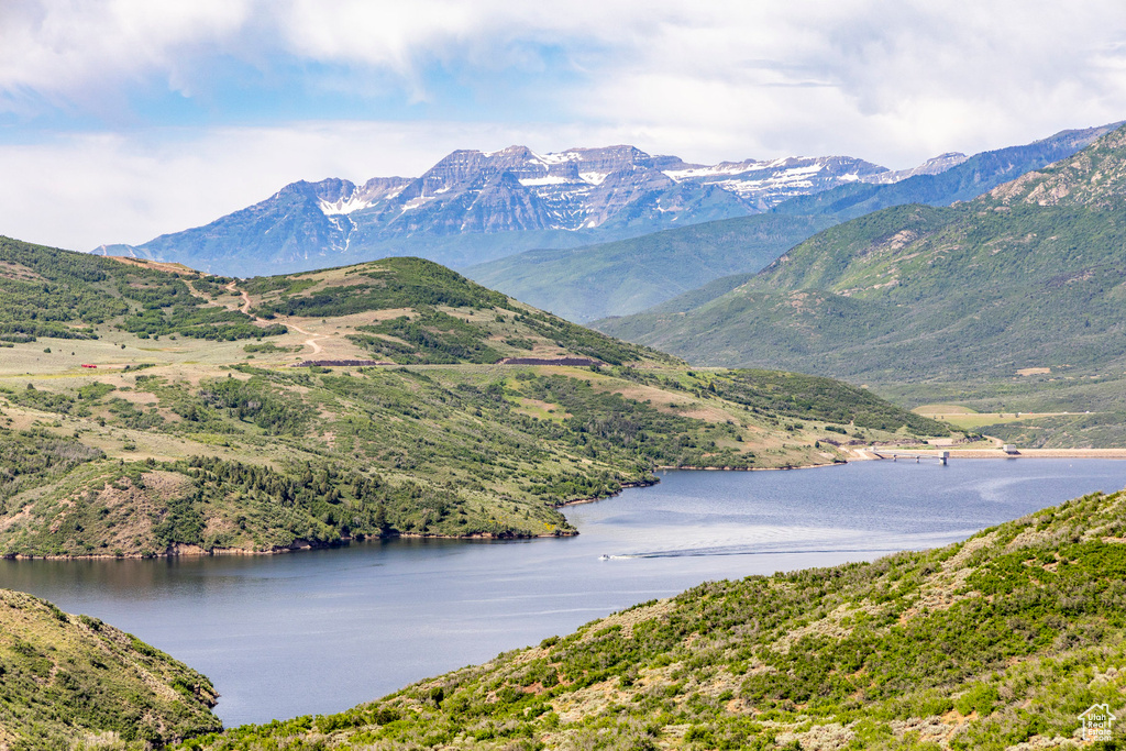 Mountain view featuring a nearby body of water