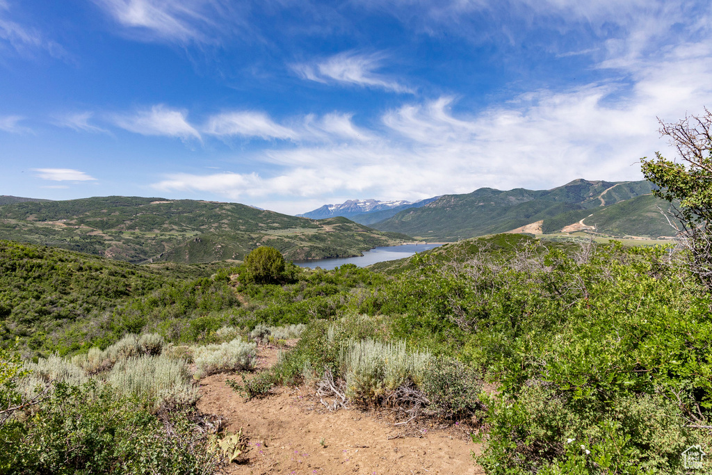 View of mountain background featuring a nearby body of water