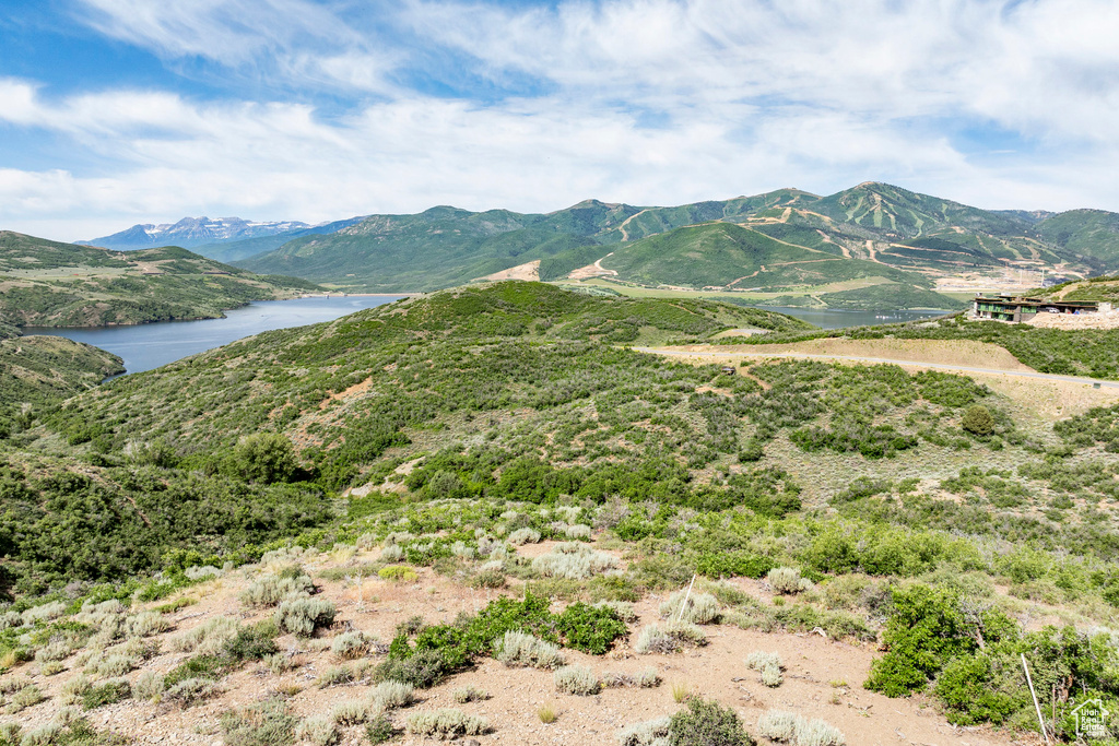 View of mountain background featuring a nearby body of water