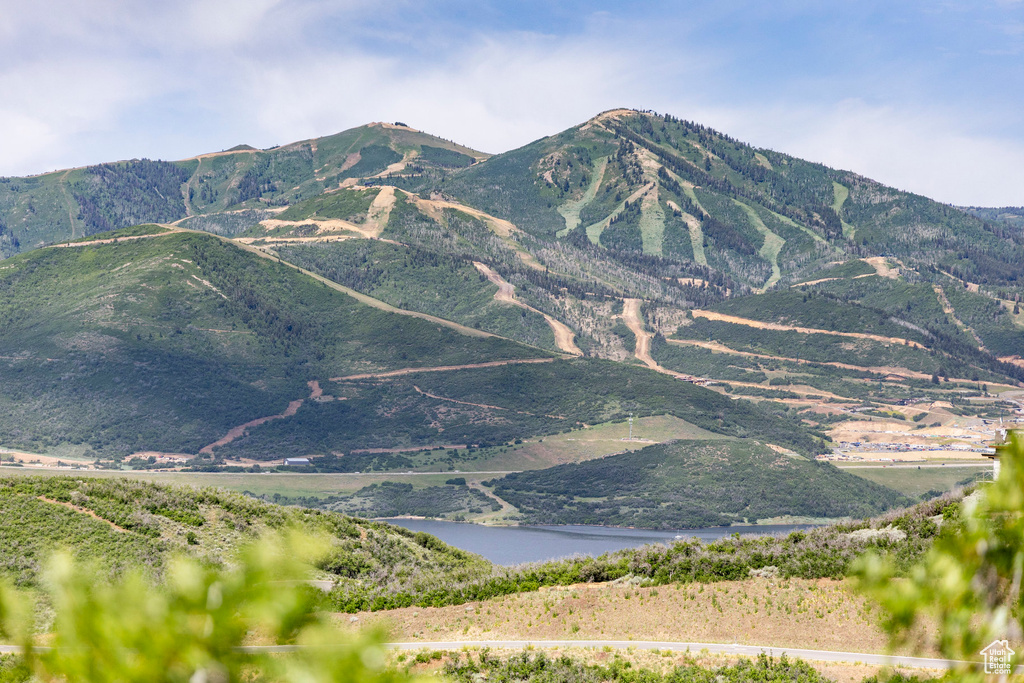 View of mountain backdrop with a large body of water