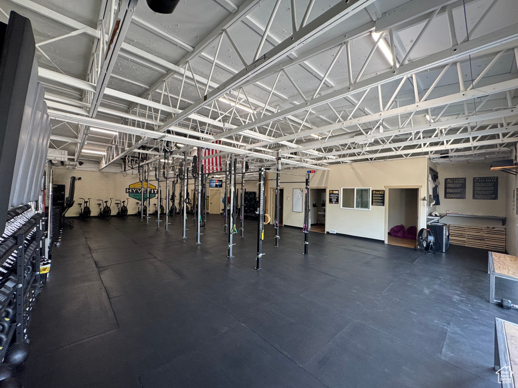 Miscellaneous room featuring rubber floors and a garage