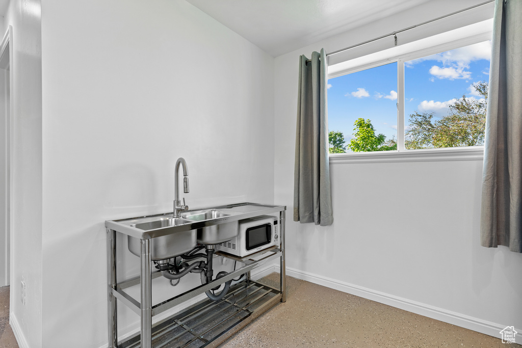 Interior space featuring baseboards