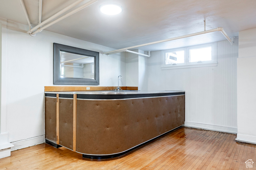 Bar with wood-type flooring