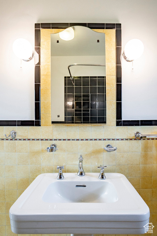 Bathroom with tile walls