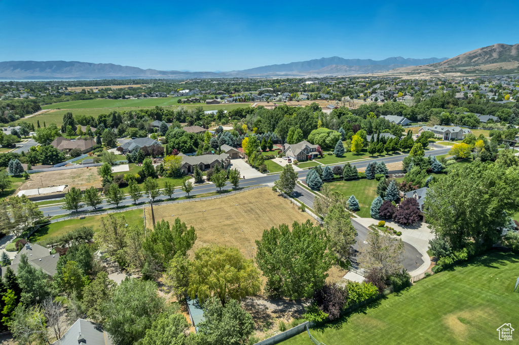 Aerial view of residential area with a mountainous background