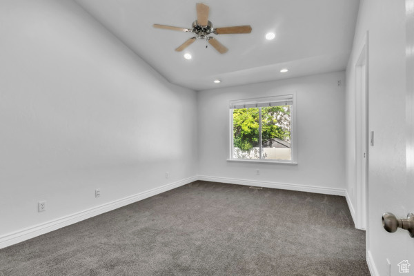 Carpeted spare room with recessed lighting and ceiling fan