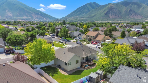 Aerial view of residential area featuring mountains