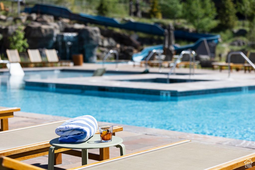 Community pool featuring a patio area