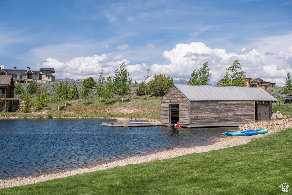 Water view with a dock