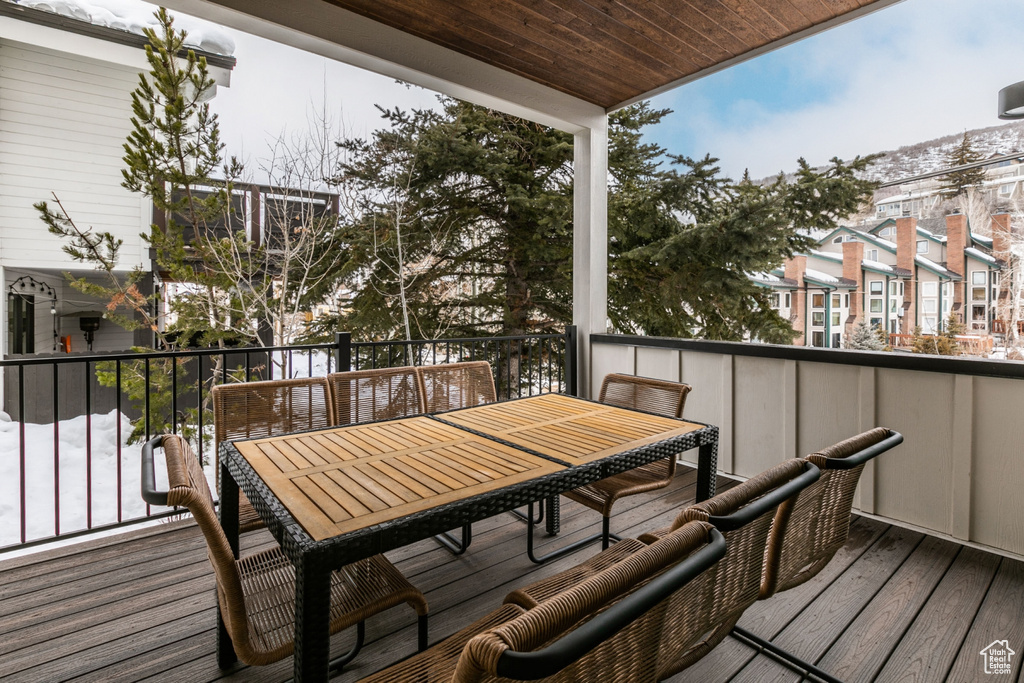 Wooden terrace with outdoor dining area