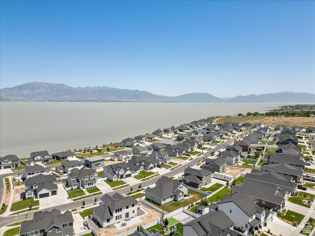 Aerial view of residential area with a water and mountain view