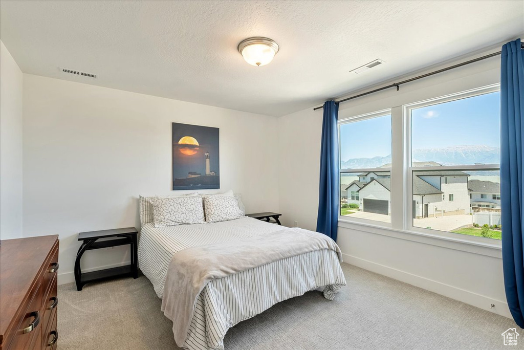 Bedroom featuring carpet flooring