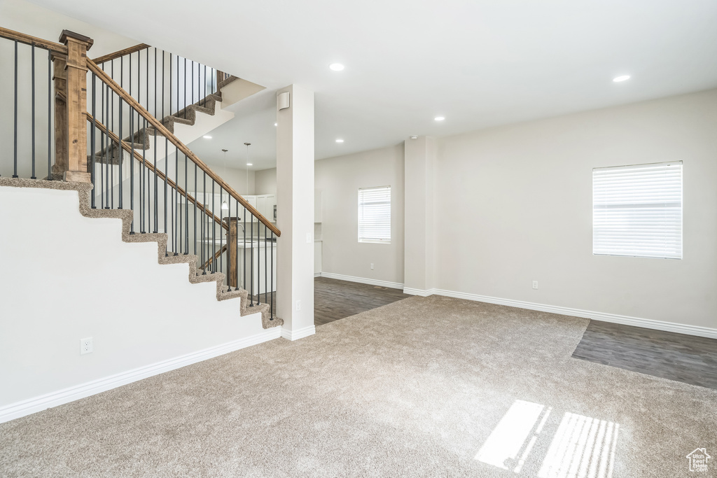 Stairs featuring carpet and recessed lighting