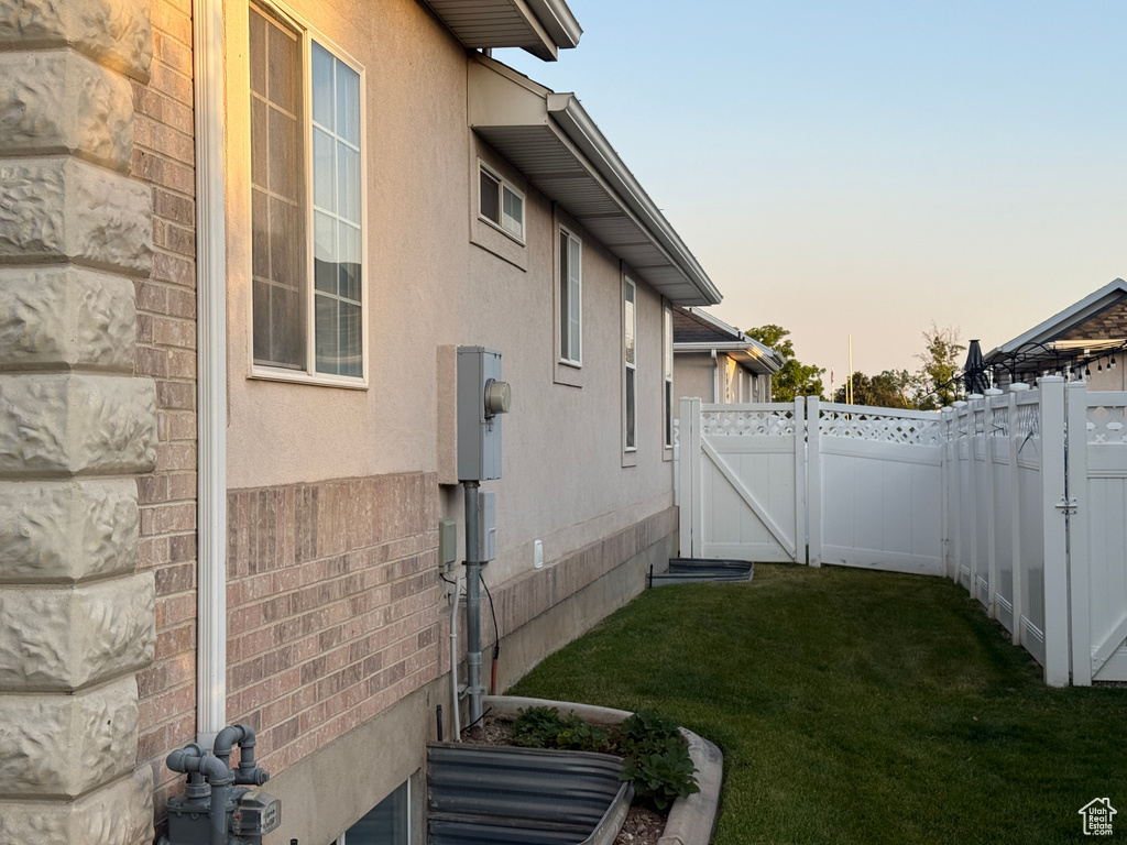 View of yard with a gate