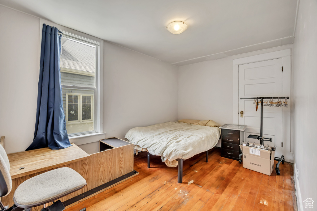 Bedroom featuring hardwood / wood-style flooring