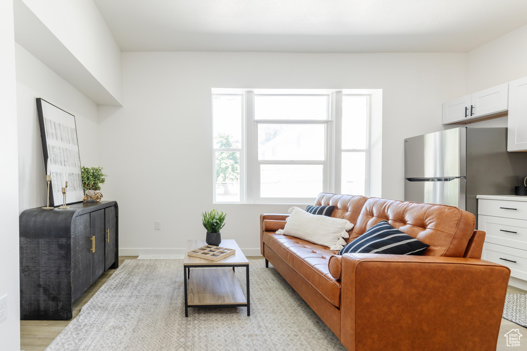 Living area with light wood-style floors