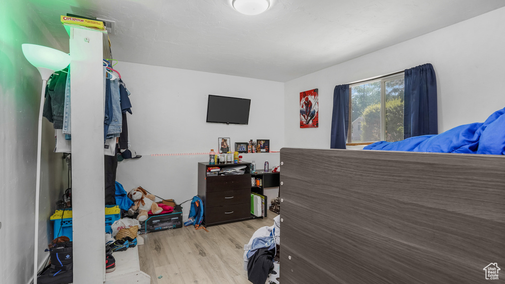 Bedroom featuring wood finished floors