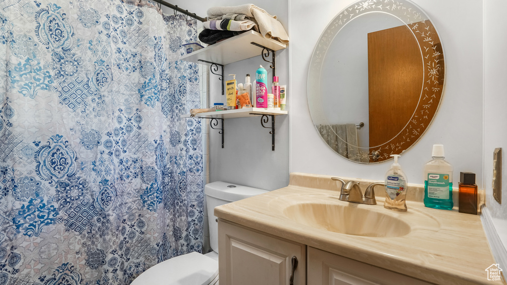 Bathroom with vanity and a shower with curtain