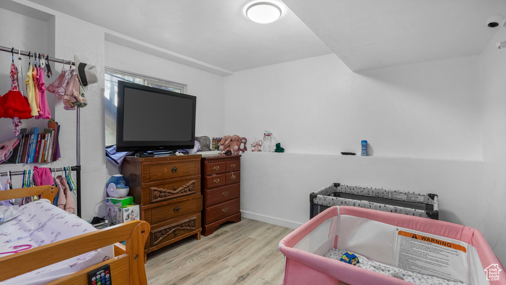 Bedroom featuring wood finished floors