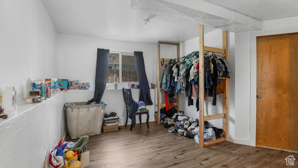 Bedroom with wood finished floors