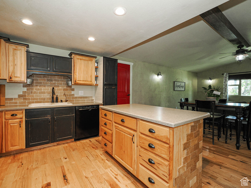 Kitchen featuring dishwasher, light wood-style floors, a ceiling fan, decorative backsplash, and recessed lighting