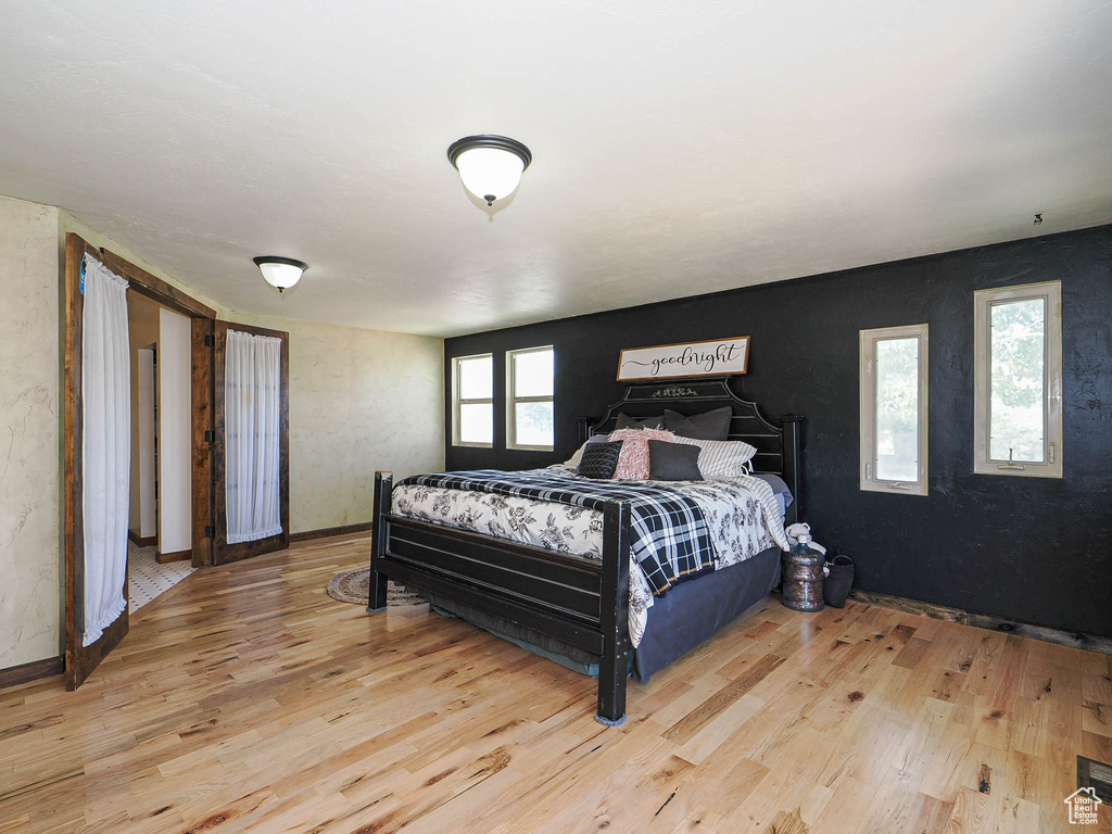 Bedroom featuring wood finished floors