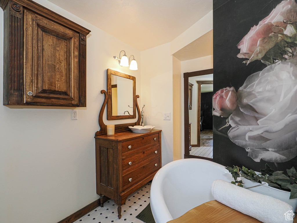 Bathroom with a freestanding bath and vanity