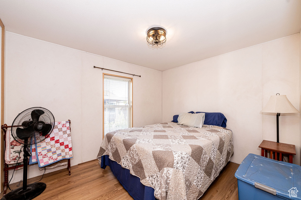 Bedroom featuring wood finished floors