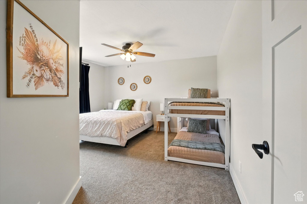 Bedroom featuring carpet floors and a ceiling fan