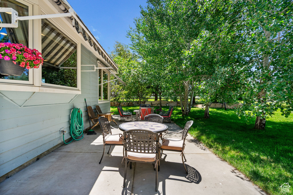 View of patio featuring outdoor dining space
