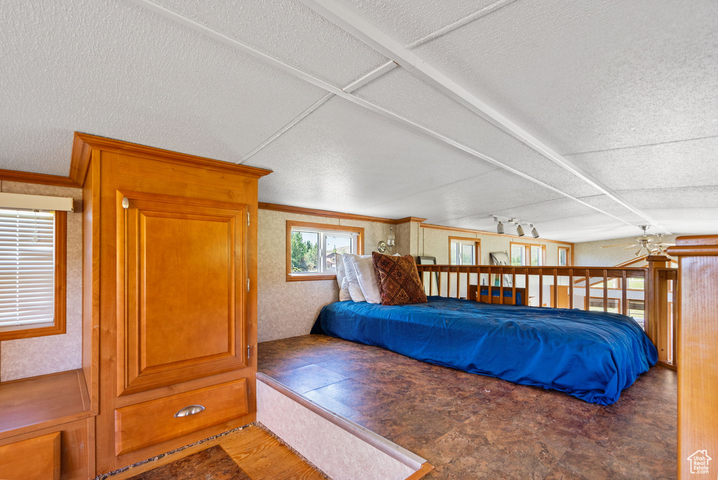 Bedroom featuring a textured ceiling