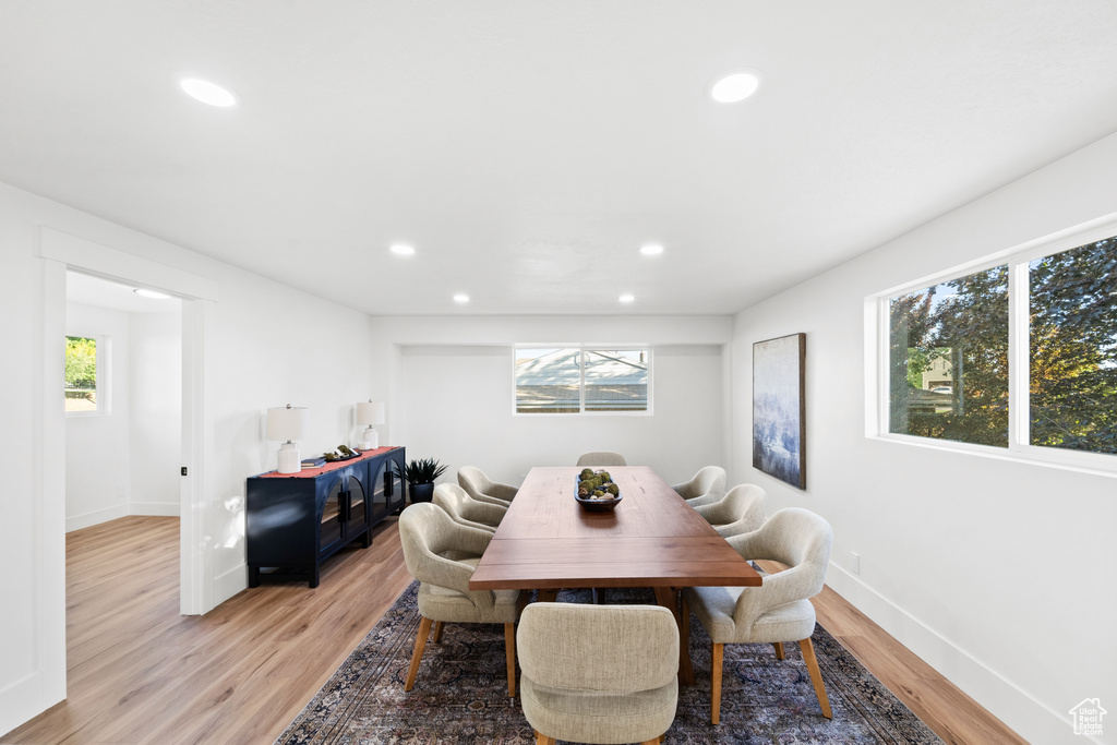 Dining room featuring recessed lighting and light wood finished floors