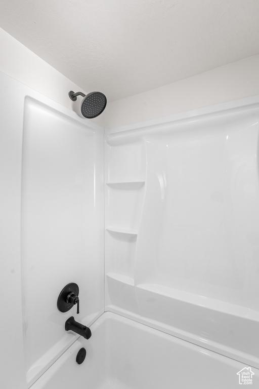 Bathroom with shower / tub combination