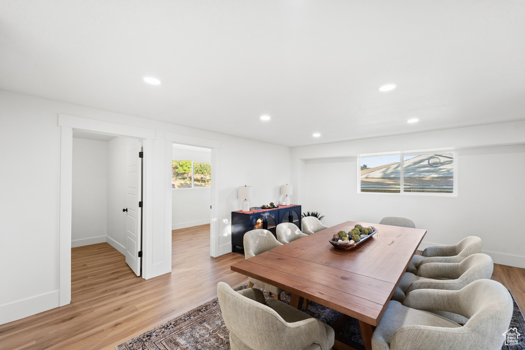 Dining area featuring light wood-type flooring and recessed lighting