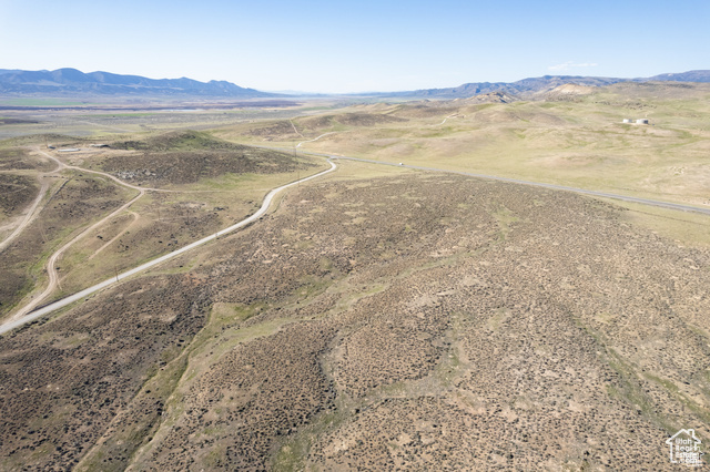 Overview of rural landscape with a mountainous background