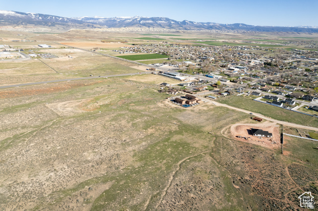 Aerial overview of property\\\\\\\\\\\\\\\\\\\\\\\\\\\\\\\\\\\\\\\\\\\\\\\\\\\\\\\\\\\\\\\'s location with a mountainous background