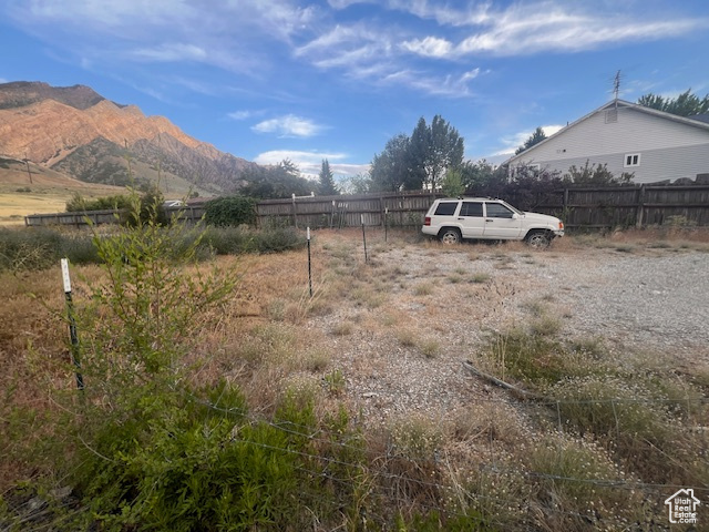 View of yard with a mountain view