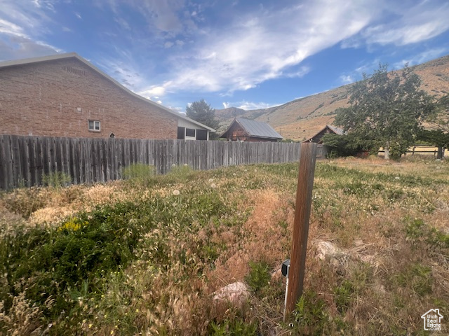 View of yard with a mountain view