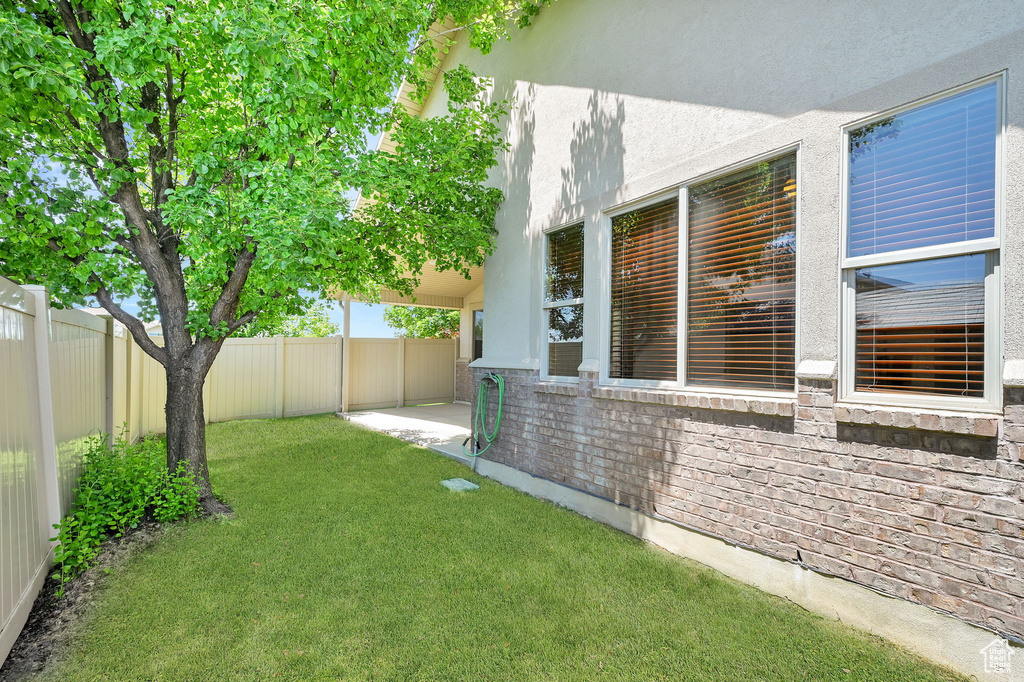 View of fenced backyard