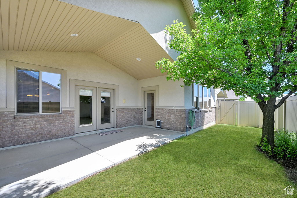 View of patio / terrace featuring french doors and a gate