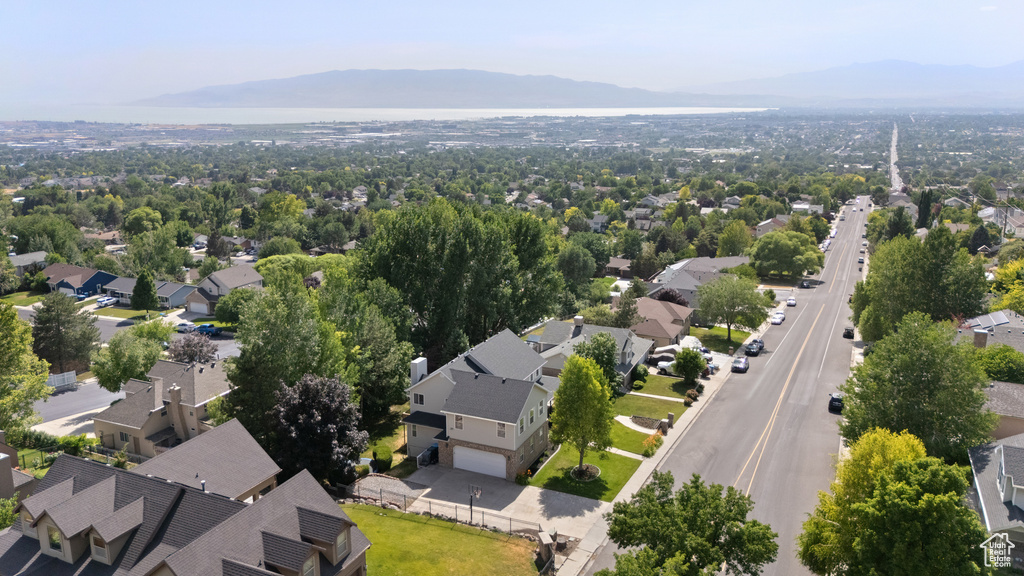 Aerial view of residential area with a mountainous background