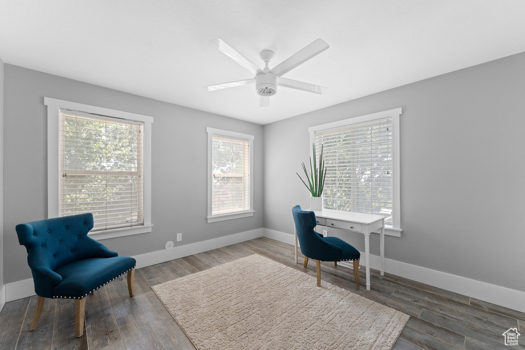 Home office with ceiling fan and wood finished floors