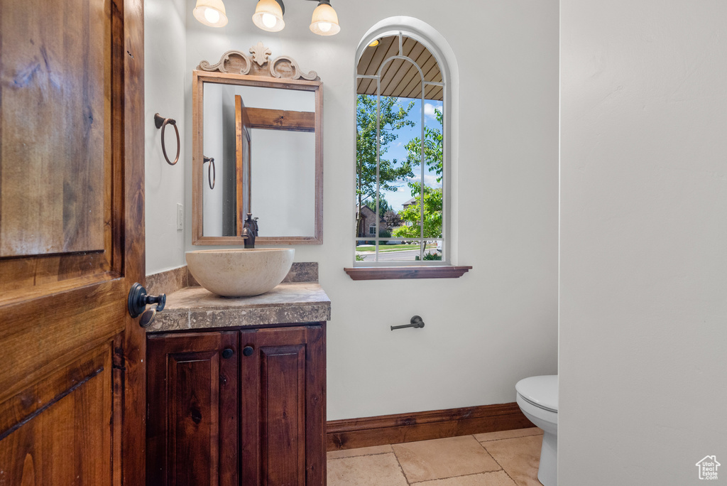 Bathroom with vanity and tile patterned floors