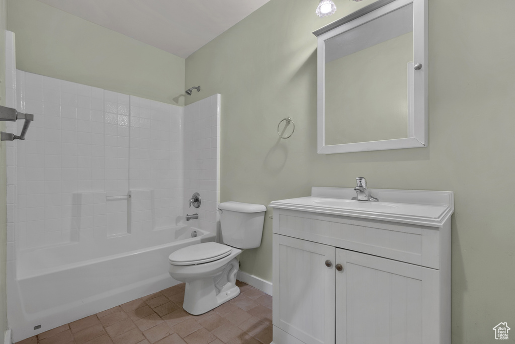 Bathroom featuring vanity and bathtub / shower combination