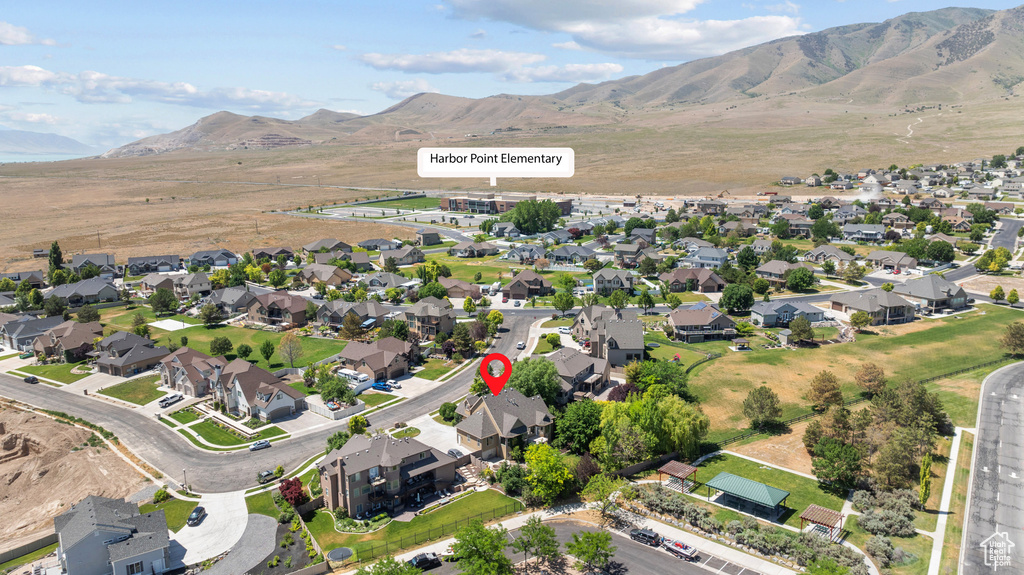 View of property location with nearby suburban area